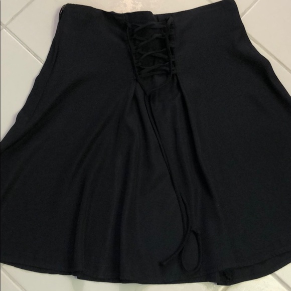 Black Circle Rayon Skirt w/lace up detail on back - Picture 2 of 6